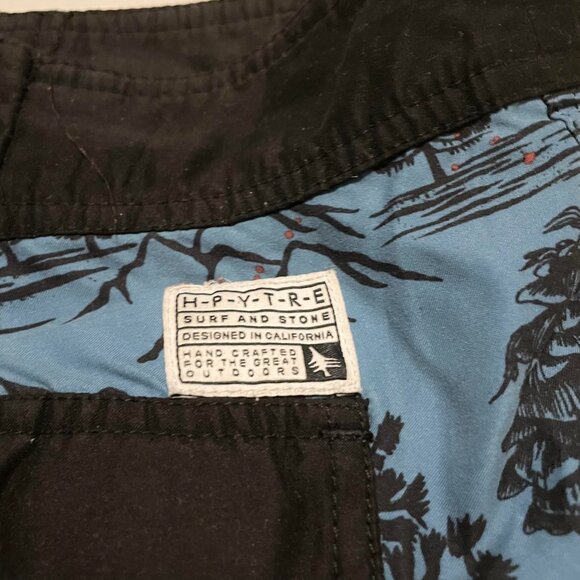 Blue and Black Swim Trunks with Red Floral Pattern - Picture 12 of 16